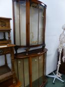 TWO VINTAGE SHAPED FRONT GLAZED DISPLAY CABINETS LARGEST H 109 W 106 D 33cms