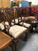 SET OF SIX CARVED MAHOGANY CHIPPENDALE STYLE DINING CHAIRS INCLUDES TWO CARVERS.