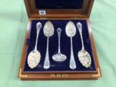 A CASED SET OF ELECTRO PLATED NICKEL SILVER BERRY SPOONS, NUTCRACKERS, GRAPE SCISSORS ETC