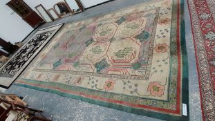 A VINTAGE MACHINE MADE CARPET OF ARTS AND CRAFTS DESIGN 544 x 353 cms