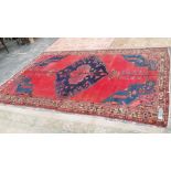 A TRIBAL ORIENTAL SMALL CARPET. 322 x 208cms