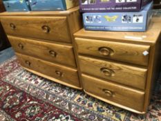 AN ERCOL PALE ELM THREE DRAWER CHEST H 68 x 92 D 44 cm's TOGETHER WITH A SIMILAR SMALL CHEST