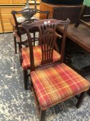 A GEORGE III MAHOGANY ELBOW CHAIR WITH PIERCED FOUR HORIZONTAL BAR BACK, THE UPHOLSTERED SEAT ON