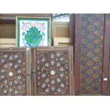 VARIOUS EASTERN INLAID AND POLY CHROMED DECORATED PANELS TOGETHER WITH A TILE PICTURE