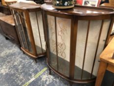 TWO VINTAGE GLAZED DISPLAY CABINETS OF SHAPED FORM THE LARGEST H 114 x W 100 x D 32cms