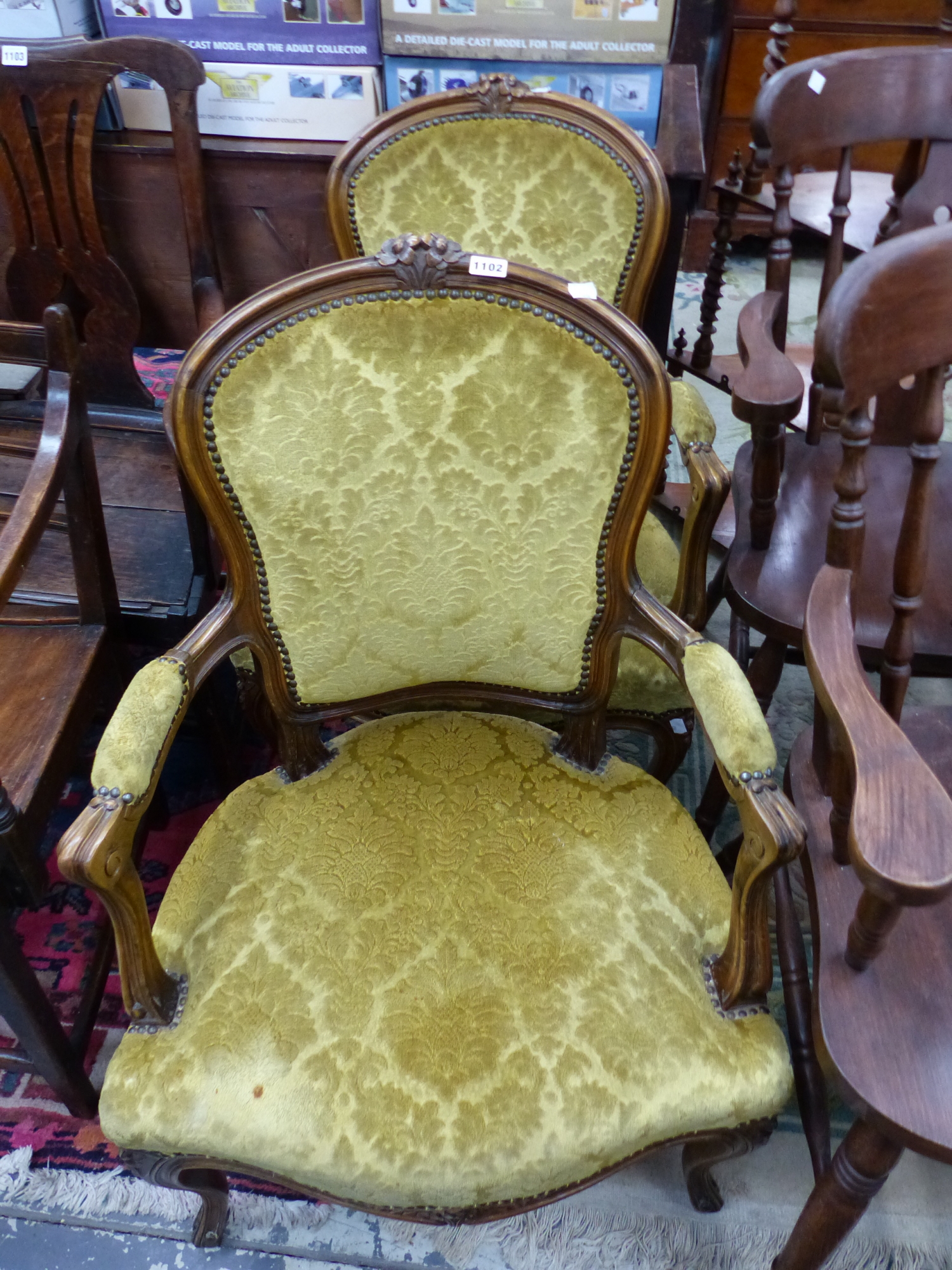 A PAIR OF SHOW FRAME FAUTEUILS UPHOLSTERED IN HONEY COLOURED VELVET DAMASK