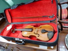 A CASED VIOLIN, UNNAMED.