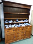 A 19th CENTURY OAK COUNTRY MADE DRESSER BASE WITH ASSOCIATED THREE TIER RACK, H 208 x W 161 x