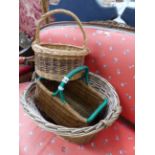 THREE WICKER BASKETS.