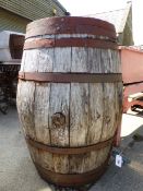 A LARGE WHISKEY BARREL WITH TAP