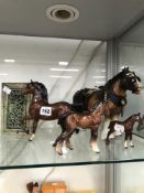 A ROYAL DOULTON HORSE FIGURE TOGETHER WITH TWO BESWICK HORSES, A SHIRE HORSE EXAMPLE AND A POTTERY