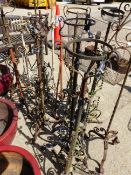 A QUANTITY OF ANTIQUE WROUGHT IRON LAMP STANDS