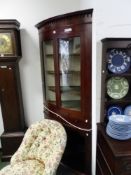 A 19th CENTURY AND LATER BOW FRONT CORNER CABINET GLAZED UPPER SECTION ABOVE OPEN SHELVES. H 198 x W