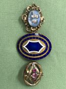 AN ENAMELED BUCKLE AND TWO FURTHER ANTIQUE BROOCHES.