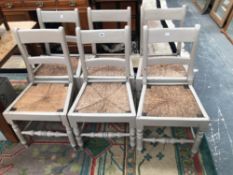 SIX ANTIQUE COUNTRY RUSH SEAT DINING CHAIRS WITH PAINTED DECORATION