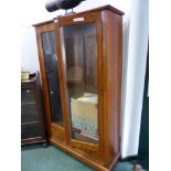 A LATE VICTORIAN OAK GLAZED TWO DOOR BOOKCASE WITH BASE DRAWERS. H 172 W 106 D 34 cm's