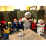 A MUSICAL CHRISTMAS BAND OF BEARS, SNOWMEN, AND ELVES WITH ELECTRICAL WIRING. (UNTESTED)