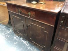 A MAHOGANY PANEL DOOR SIDE CABINET WITH APRON DRAWER. H 79 W 93 D50cms