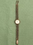 A LADIES 9ct GOLD TUDOR BRACELET WATCH THE LADDER CLASP STAMPED ROLEX WITH A ROLEX LOGO, GROSS
