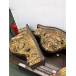 A PAIR OF GILDED ROCOCO STYLE WALL BRACKETS TOGETHER WITH ANOTHER OF REGENCY DESIGN