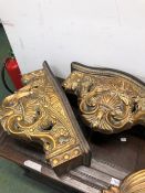 A PAIR OF GILDED ROCOCO STYLE WALL BRACKETS TOGETHER WITH ANOTHER OF REGENCY DESIGN
