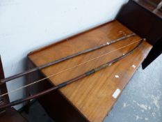 A VINTAGE LONG BOW TOGETHER WITH A BAMBOO WADING STAFF.