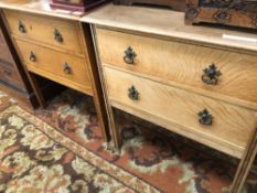 AN EDWARDIAN CARVED OAK MIRROR BACK DRESSING CHEST. H 142 W 76 D 46cms TOGETHER WITH A SIMILAR TWO
