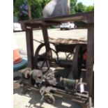 AN ANTIQUE TREADLE LATHE