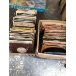 A COLLECTION OF SINGLE RECORDS MOSTLY ROCK AND POP 60'S, 70's AND 80's