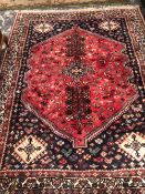 A PERSIAN SHIRAZ RUG 220 x 165 cm's