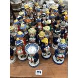 A COLLECTION OF VARIOUS CHARACTER FORM SALT AND PEPPER AND OTHER CRUETS.