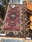 TWO MACHINE MADE PERSIAN DESIGN SMALL RUNNERS LARGEST 230 x 93 cms.