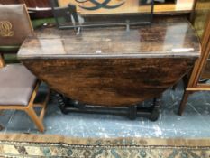 AN 18th C. OAK OVAL DROP FLAP TABLE WITH A DRAWER TO ONE END, THE TURNED LEGS JOINED BY STRETCHERS