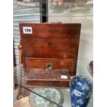 A MAHOGANY APOTHECARY MEDICINE CHEST AND A SET OF ANTIQUE SCALES