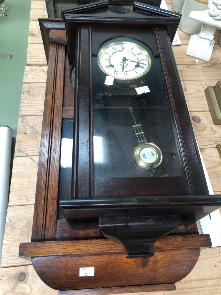 A ANTIQUE MAHOGANY CASED DROP DIAL VIENNA TYPE WALL CLOCK TOGETHER WITH A LATER OAK EXAMPLE AND A