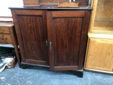 A GEORGIAN CARVED MAHOGANY TWO DOOR SIDE CABINET, 110 x 110 x 55cms