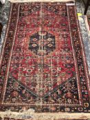 A PERSIAN HAMADAN RUG 203 x 128 cm's