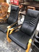 A PAIR OF CONTEMPORARY BLACK LEATHER ARMCHAIRS WITH BENTWOOD FRAMES