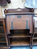 A ART NOUVEAU STYLE OAK SLANT FRONT WRITING DESK, H 125 x W 71 x D 31cms