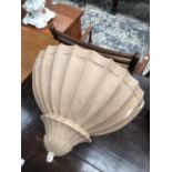 A PLASTER WALL LIGHT, THE EXTERIOR OF THE SHELL SHAPE FLUTED AND PAINTED IN OATMEAL