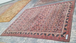 A MACHINE MADE CARPET OF PERSIAN DESIGN 340 x 250 cms