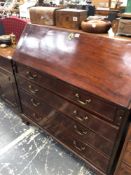 A GEORGIAN MAHOGANY SLANT TOP BUREAU. H 107 W 107 D 52cms