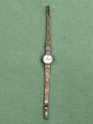 A LADIES VINTAGE TUDOR WATCH ON A 9ct GOLD BRACELET STRAP, GROSS WEIGHT 17.1grms