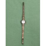 A LADIES VINTAGE TUDOR WATCH ON A 9ct GOLD BRACELET STRAP, GROSS WEIGHT 17.1grms