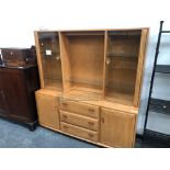 A CONTEMPORARY LONG ELM ERCOL GLAZED CABINET, THREE DRAWER LOWER CABINET SECTION WITH CUPBOARDS, 160