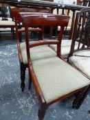 A PAIR OF EARLY 19th C. MAHOGANY CHAIRS WITH BROAD CURVED TOP RAILS, DROP IN SEATS AND OCTAGONAL