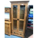 A CONTEMPORY OAK GLAZED TWO DOOR BOOKCASE 194 x 90 x 38cms