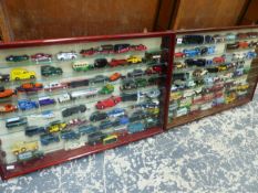TWO GLAZED WALL DISPLAY CABINETS CONTAINING DIE CAST VEHICLES.