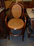 A VINTAGE BENTWOOD CHILDS HIGHCHAIR.