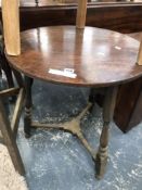 AN ANTIQUE COUNTRY MADE PINE CRICKET TABLE H 76 DIA 50cms TOGETHER WITH A LATER OAK EXAMPLE